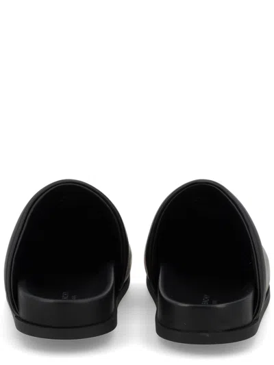 Givenchy Leather Slippers Featuring Flat Sole Design