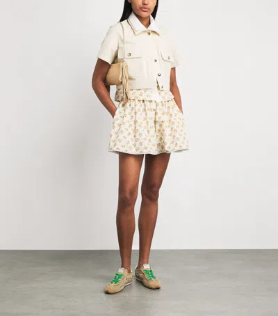 Maje Printed Button-front Mini Skirt In Yellow