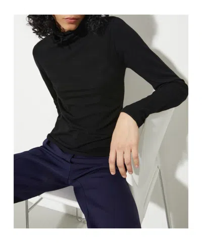 Maxco. In Black