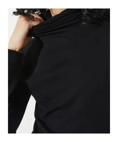Maxco. In Black