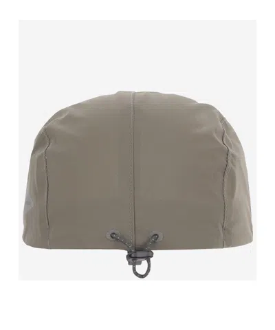 And Wander Drawstring Hat In Gray