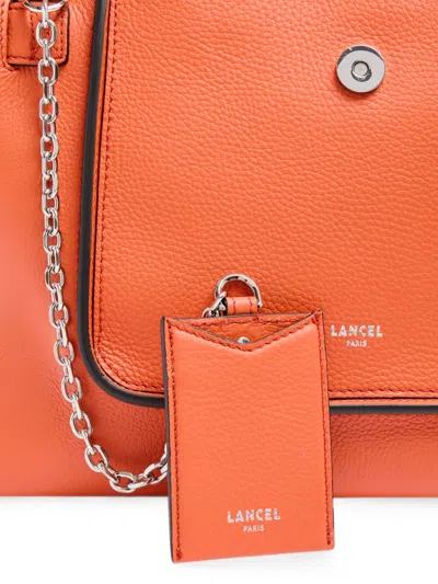 Lancel Medium Thea Grained Handbag In Orange