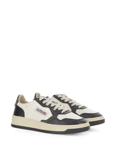 Autry Medalist Low Sneakers In Calf Leather With Perforated Toe In Black
