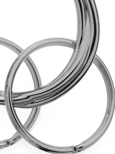 Jil Sander Engraved-logo Twisted-effect Keyring In Silver