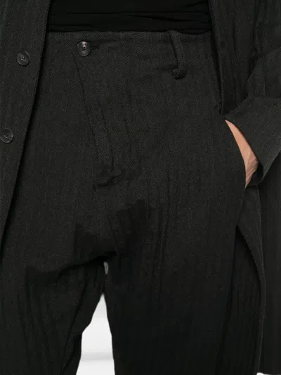 Masnada Herringbone-pattern Belt-loop Trousers In Black