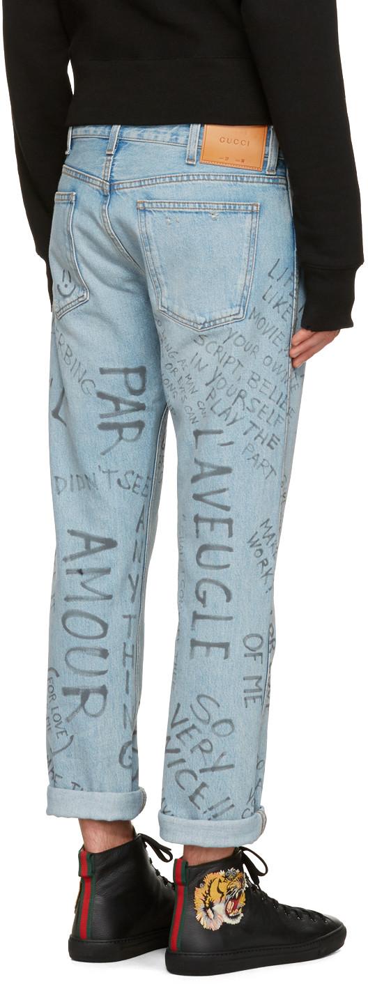 gucci writing jeans