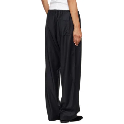 Ssstein Black Wool Silk Drawstring Easy Trousers In Black