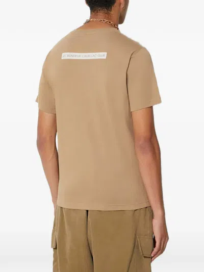 Universal Works 로고 프린트 티셔츠 In Brown