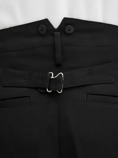 Visvim Buttoned Tab Trousers In Black