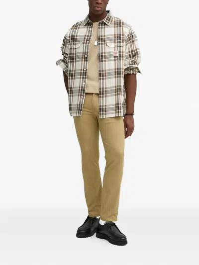 Levi's 511 버튼 클로저 진 In Brown