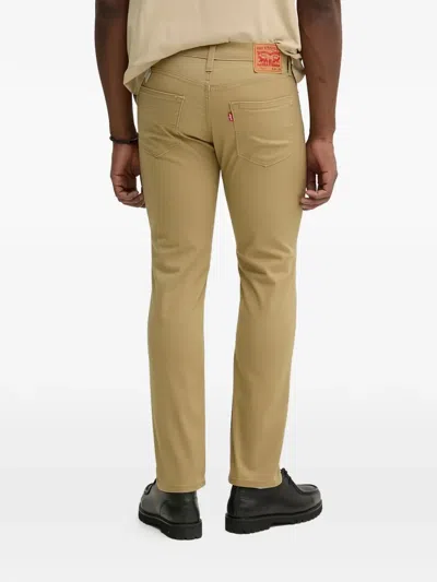 Levi's 511 버튼 클로저 진 In Brown