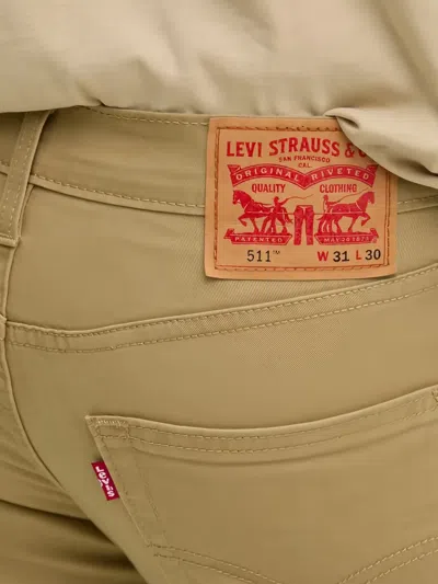 Levi's 511 버튼 클로저 진 In Brown