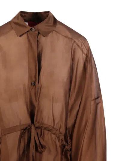 The Latest 달리다 드로스트링 블라우스 In Brown