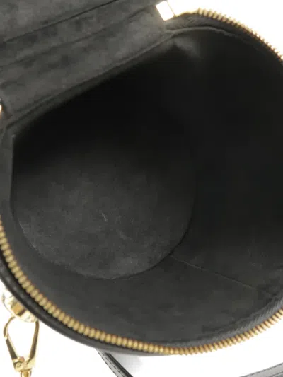 Louis Vuitton 칸 모노그램 리버스 캔버스 버킷 백 In 브라운