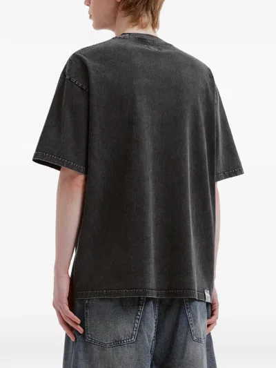 Izzue Embossed-graphic T-shirt In Black
