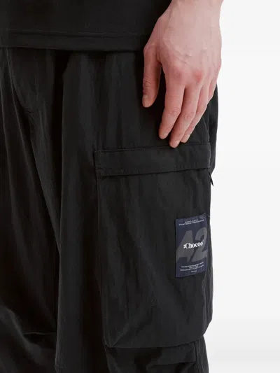 Chocoolate 로고 패치 카고 팬츠 In Black