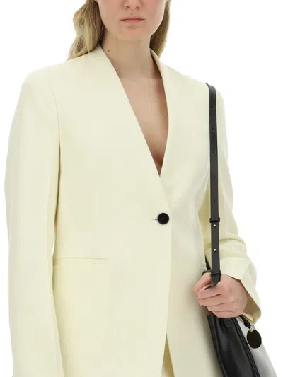 Jil Sander V-neck Jacket With Concealed Closure In Yellow