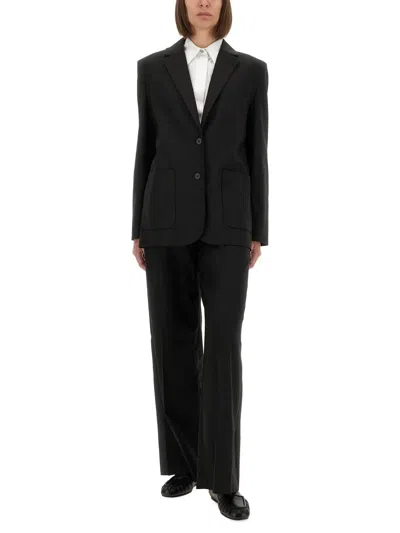The Garment Relaxed Fit Ribbon Blazer With Unique Back Bow Detail In Black