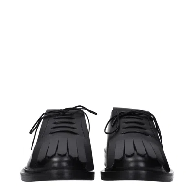 Max Mara Leather Derby. In Multi