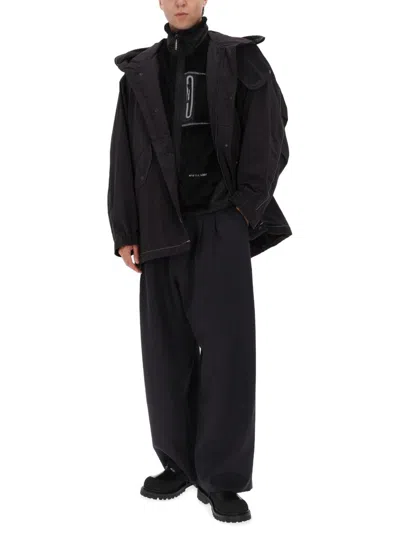 And Wander Loose Fishtail Octa Polyester-blend Hooded Jacket In Black