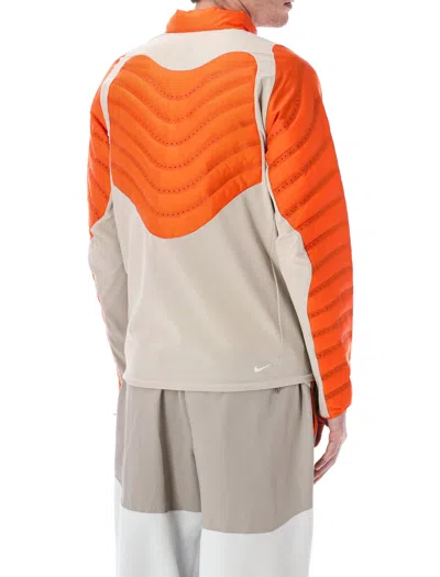 Nike Acg Lava Loft Down Trail Jacket In Orange