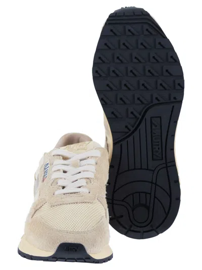 Autry Reelwind Suede And Technical Textile Trainer In Neutral