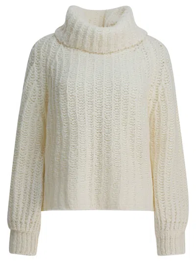Rakkì Roll-neck Sweater In White