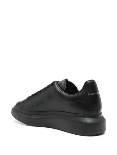 Alexander Mcqueen Men Black Oversize Sneakers With Logo Lettering On The Heel In Leather Man In Black