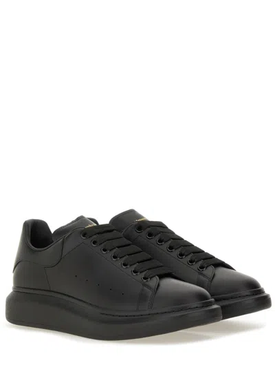 Alexander Mcqueen Men Black Oversize Sneakers With Logo Lettering On The Heel In Leather Man In Black