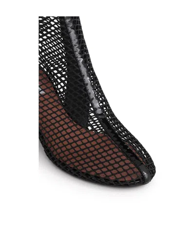 Alaïa Fishnet Patent Leather-trimmed Ankle Boots In Black