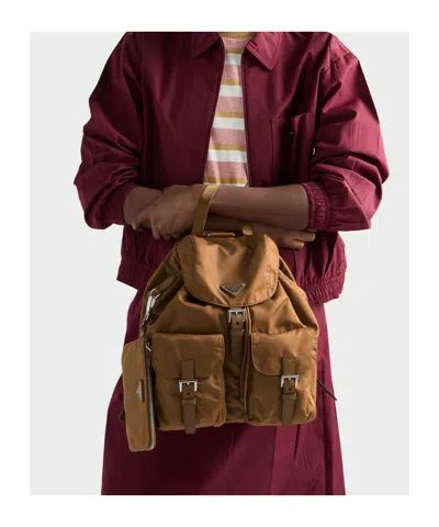 Prada Medium Re-nylon Backpack In Brown