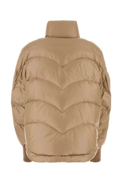 Khrisjoy Quilted High Collar Down Jacket With Side Pockets In Brown