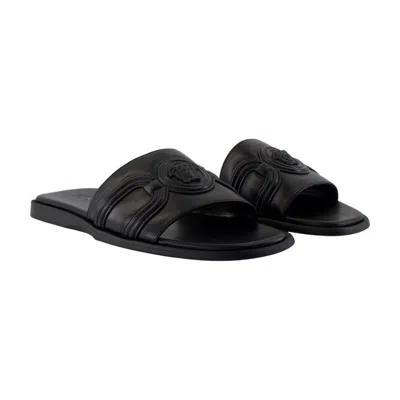 Versace Chic Leather Sandals In Black