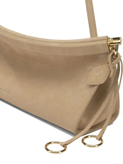 Alaïa “le Click East West”中号单肩包 In Neutral