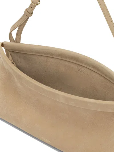 Alaïa “le Click East West”中号单肩包 In Neutral