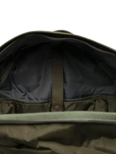 Porter Backpack Adjustable Shoulder Straps Front Pocket Top Handle