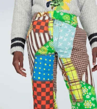 Erl Printed Cotton-blend Flared Pants In Multi