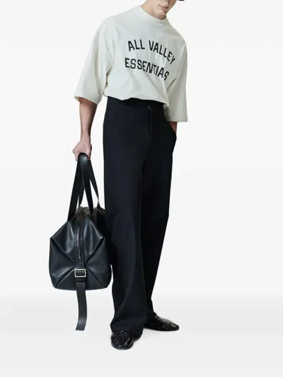 Essentials Merch Tee Logo-print Drop-shoulder T-shirt In White