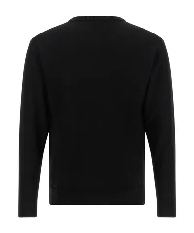Moschino Virgin Wool Ribbed Crewneck Long-sleeve T-shirt In Black
