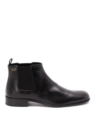Prada Pull-tab Ankle Boot In Black