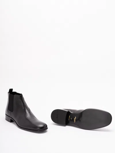 Prada Pull-tab Ankle Boot In Black