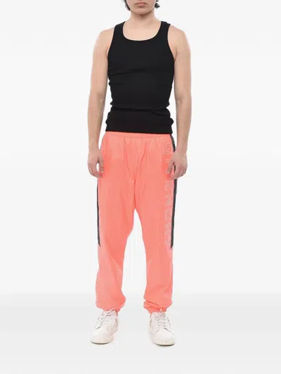 Givenchy Logo-print Track Pants In Orange