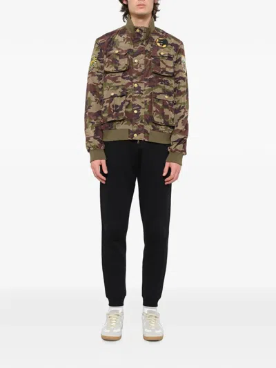 History Repeats Camouflage-print Patch-detail Jacket In Multi