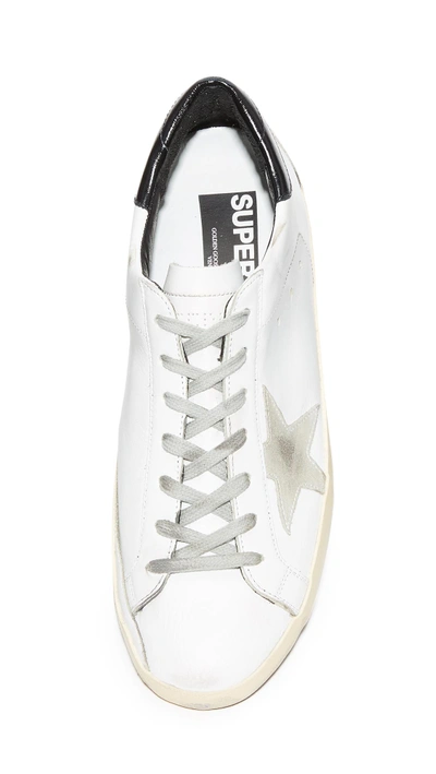 Shop Golden Goose Superstar Sneakers In White/black