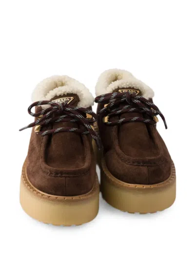 Prada Shearling Lined Suede Booties In Brown