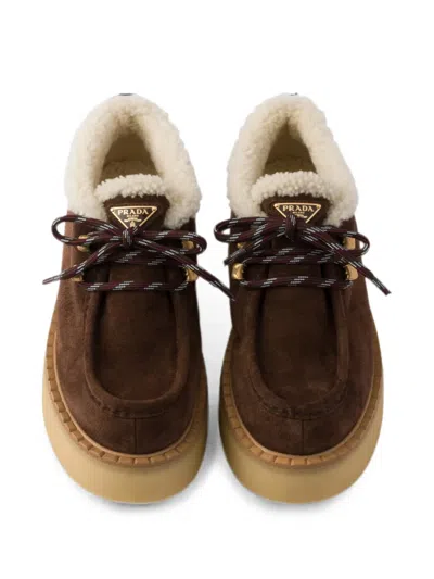 Prada Shearling Lined Suede Booties In Brown