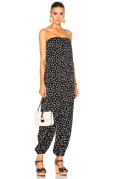 Shop Dolce & Gabbana Strapless Polka Dot Jumpsuit In Black, Geometric. In Black & White