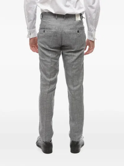 Cruna Houndstooth-pattern Trousers In Gray