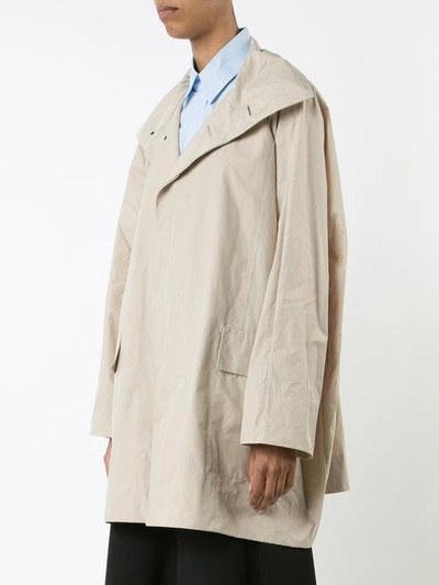 Shop Issey Miyake Classic Short Raincoat