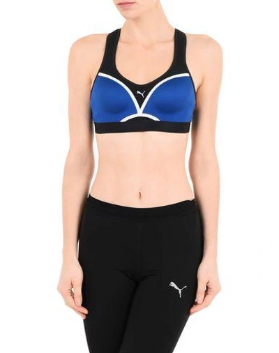 Shop Puma Sports Bras And Performance Tops In Blue